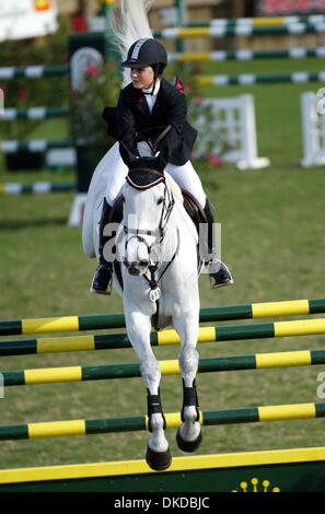 Dec 03, 2006; Wellington, FL, USA; The 123rd National Horse Show and Family Festival was held Sunday at The Palm Beach Polo Equestrian Club,  showcasing the nation's top Equestrians in the Hunter, Jumper and Dressage disciplines. Here, Georgina Bloomberg competes in the $50,000 Rolex/USEF National Show Jumping Championship.  Mandatory Credit: Photo by Bruce R. Bennett/Palm Beach Po Stock Photo