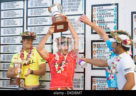 Dec 06, 2006; North Shore, HI, USA; Surfing: O'Neill World Cup of Surfing, November 24-Dec 6 2006. Current ASP world number six JOEL PARKINSON (Coolangatta, Gold Coast, Aus) claims his victory at the prize giving of the O'Neill World Cup of Surfing title at Sunset Beach, Hawaii today. Parkinson posted the only perfect 10 points score of the entire contest during the final against r Stock Photo