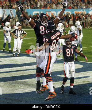 Feb 04, 2007 - Miami, Florida, USA - Bear's quarterback #8 REX GROSSMAN  hands off the ball during the second quarter during Super Bowl XLI. The  Colts defeated the Bears 29 