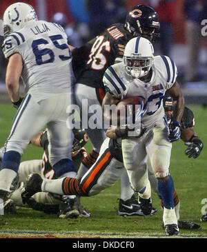 Feb 04, 2007 - Miami, Florida, USA - Bear's quarterback #8 REX GROSSMAN  hands off the ball during the second quarter during Super Bowl XLI. The  Colts defeated the Bears 29 