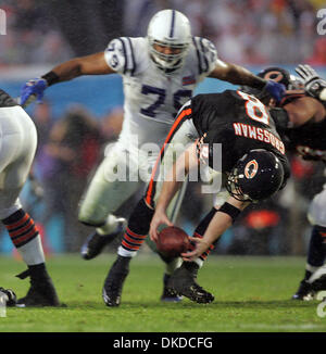 Feb 04, 2007 - Miami, Florida, USA - Bear's quarterback #8 REX GROSSMAN  hands off the ball during the second quarter during Super Bowl XLI. The  Colts defeated the Bears 29 