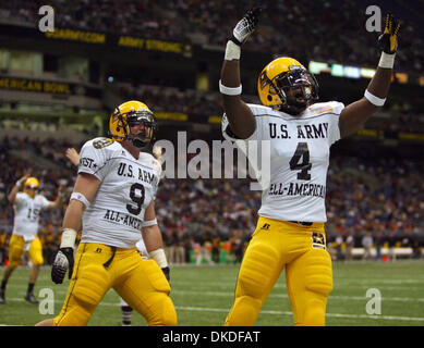 Jan 06, 2007 - San Antonio, TX, USA - 2007 US Army All-American Bowl. West squad's JOE McKNIGHT (right) celebrates after scoring a touchdown against the East squad as teammate CHRIS GALLIPO looks on  Saturday Jan. 6, 2007 at the Alamodome The West squad went on to win 24-7. Stock Photo