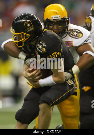 Jan 06, 2007 - San Antonio, TX, USA - 2007 US Army All-American Bowl. East squad's MATT SIMMS is sacked by West squad's EVERSON GRIFFIN Saturday Jan. 6, 2007 at the Alamodome. The West squad went on to win 24-7. Stock Photo