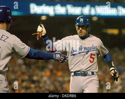 Apr 06, 2007 - San Francisco, CA, USA - MLB Baseball: Los Angeles Dodger NOMAR GARCIAPARRA is congratulated by teammate LOUIS GONZALEZ after scoring on a Jeff Kent hit during the 6th inning of their Major League Baseball game vs the San Francisco Giants at AT&T Park. The Los Angeles Dodgers beat the San Francisco Giants 2-1 in Friday nights game. (Credit Image: © Dean Coppola/Contr Stock Photo