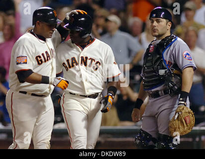 May 07, 2007 - San Francisco, CA, USA - MLB Baseball: San Francisco Giants Bengie Molina, #1, is congratulated by teammate Ray Durham, #5, after hitting a two-run home run as New York Mets catcher Paul Lo Duca, #16, watches in the 5th inning of their game on Monday, May 7, 2007, at AT&T Park in San Francisco, Calif. Later in the same inning Molina would hit a three-run home run. (C Stock Photo