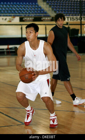 Chinese basketball player Yi Jianlian at practice with Australian player Matty Knight in Carson, Calif., Wednesday, June 20, 2007. Mark Avery for The New York Times Stock Photo