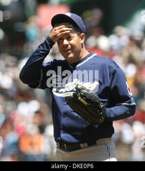 Dec 13, 2006; San Diego, CA, USA; Greg Maddux brings his four Cy Young  Awards to the San Diego Padres, meeting the media at Petco Park and trying  on a number 37