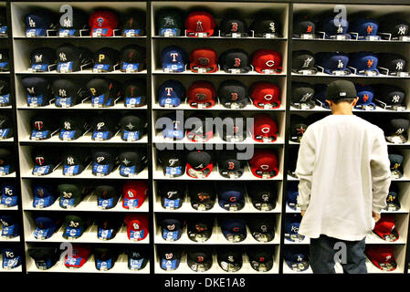 July 6th, 2007 - San Francisco, CA, USA -  Nick Yee, 13, of Hercules takes a look at baseball caps during the All-Star FanFest at Moscone West center in San Francisco, Calif., on Friday Jul. 6, 2007. (Credit Image: © Ray Chavez/The Oakland Tribune/ZUMA Press) Stock Photo