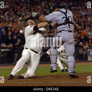 San Francisco Giants athlete Ryan Klesko is safe at the plate while Miguel Olive can't make the play during 6th inning action against the Florida Marlins Friday, July 28, 2007, at AT&T Park in San Francsico, Calif. (Ron Lewis/San  Mateo County Times) Stock Photo