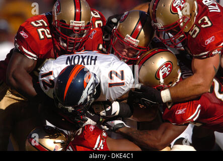 August 13th 2007 - San Francisco, CA, USA -   Denver Broncos Domenik Hixon, #12, is gang tackled by the San Francisco defense in the 2nd quarter of their preseason game on Monday, August 13, 2007 at Monster Park in San Francisco, Calif. (Credit Image: © Jose Carlos Fajardo/Contra Costa Times/ZUMA Press) Stock Photo