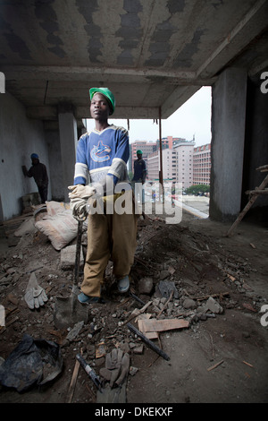 Construction workers on a high rise building site, Nairobi, Kenya Stock Photo