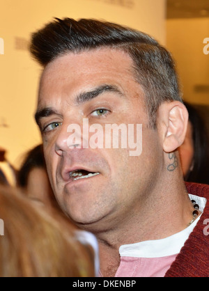 Robbie Williams Robbie Williams launches his menswear clothes label 'Farrell' with designer Ben Dickens at Brown Thomas Dublin Stock Photo