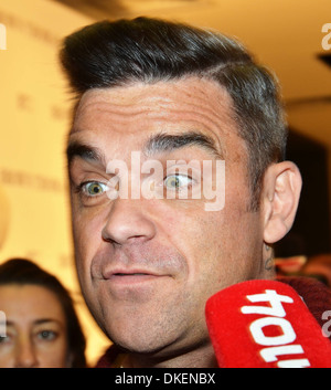 Robbie Williams Robbie Williams launches his menswear clothes label 'Farrell' with designer Ben Dickens at Brown Thomas Dublin Stock Photo