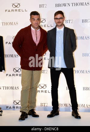 Robbie Williams Ben Dickens Robbie Williams launches his menswear clothes label 'Farrell' with designer Ben Dickens at Brown Stock Photo