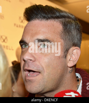 Robbie Williams Robbie Williams launches his menswear clothes label 'Farrell' with designer Ben Dickens at Brown Thomas Dublin Stock Photo