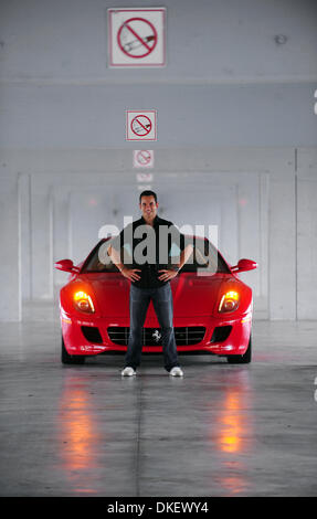 CAV) Helio-Castroneves-Indy-s080409A.CAV - Three-time Indy  500 winner Helio Castroneves is seen with a Ferrari in the garage area at Homestead Motor Speeday, Tuesday, Aug. 4, 2009. Castroneves was driving four ''dream cars,'' for Maxim Magazine. Joe Cavaretta, Sun Sentinel  (Credit Image: © Sun-Sentinel/ZUMApress.com) Stock Photo