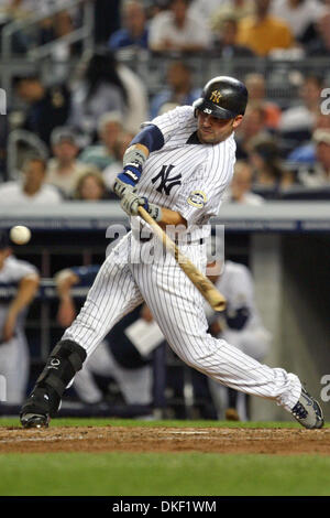 New York Yankees Outfielder Nick Swisher (#33) heads to first. The