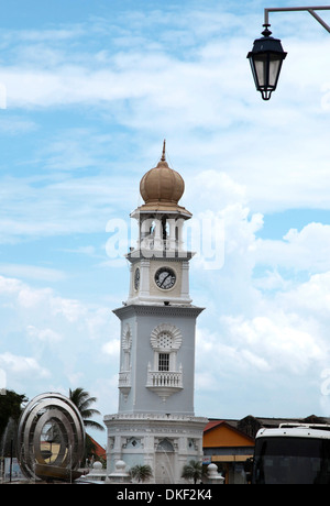 It's a photo in the streets of Georgetown in Penang in Malaysia. We can see a Colonial Building  or tower or arcades Stock Photo