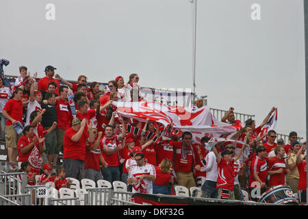 16 August 2009: Chicago Fire supporters' cheer after a first half goal by Chris Rolfe in the thirteenth minute to go up 1-0. The Chicago Fire went on to defeat the Kansas City Wizards 2-0 at CommunityAmerica Ballpark in Kansas City, KS. (Credit Image: © Southcreek Global/ZUMApress.com) Stock Photo