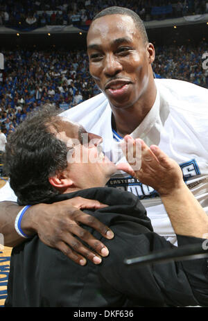 May 30, 2009 - Orlando, Florida, USA - Orlando Magic center DWIGHT HOWARD and coach STAN VAN GUNDY celebrate after beating the Cleveland Cavaliers in game six of the Eastern Conference Finals at Amway Arena in Orlando, FL Saturday, May 30, 2009. (Credit Image: © Gary W. Green/Orlando Sentinel/ZUMA Press) RESTRICTIONS: * Daytona and Online RIGHTS OUT * Stock Photo