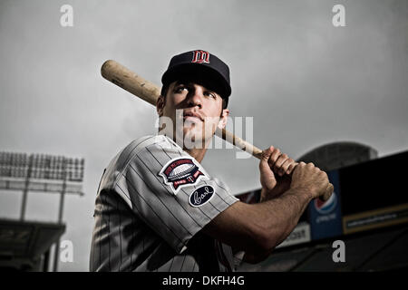 The Minnesota Twins' Joe Mauer poses for photographs with his twin girls,  Emily and Maren, prior to the start of play against the Chicago White Sox  at Target Field in Minneapolis on Saturday, June 21, 2014. The Twins won,  4-3. (Photo by Jim Gehrz