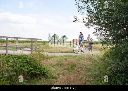 Couple out for bike ride Stock Photo