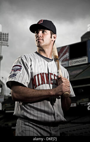 21 August 2009: Minnesota Twins catcher Joe Mauer (7) awarded 1st base  after his second intentional walk during Friday's baseball game, the  Minnesota Twins defeated the Kansas City Royals 5-4 in 10