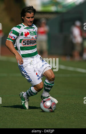 Jun 28, 2009 - Kansas City, Kansas, USA - Jorge Estrada #4 of Club Santos Laguna turns with the ball during the Santos Laguna vs Kansas City Wizards soccer match in the SuperLiga 2009 tournament play. Santos Laguna defeated the Kansas City Wizards 3-1 at CommunityAmerica Ballpark. (Credit Image: © Tyson Hofsommer/Southcreek Global/ZUMA Press) Stock Photo