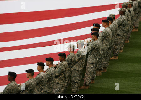 Jul 14, 2009 - St. Louis, Missouri, USA - MLB Baseball - U.S. Army soldiers from the 5th Engineering Battalion from Ft. Leonard Wood kickoff the start of Tuesday's MLB All-Star Game at Busch Stadium in downtown St. Louis. (Credit Image: © Robert Cohen/St Louis Post-Dispatch/ZUMA Press) RESTRICTIONS: * Alton, Belleville, Edwardsville, Moline, Rock Island (Illinois) Newspapers and US Stock Photo