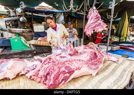 Fresh pork being prepared at street market in the capital city of Phnom Penh, Cambodia, Indochina, Southeast Asia, Asia Stock Photo