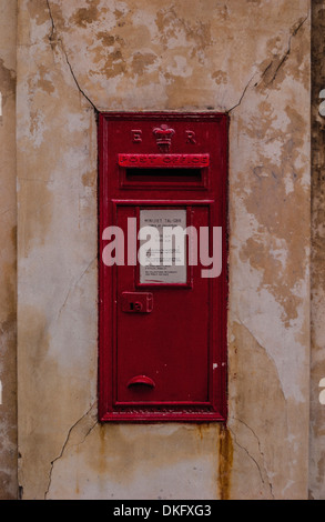 Red British postbox, Mdina - medieval walled town situated on a hill in the centre of Malta. Stock Photo