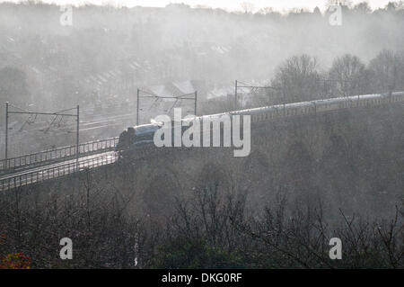 Durham, UK. 5th December 2013. A steam train A4 Bittern crossing Durham viaduct during snow storm 5-12-13 Credit:  Washington Imaging/Alamy Live News Stock Photo