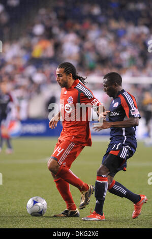 Aug. 02, 2009 - Foxboro, Massachusetts, USA - August 1 2009: Toronto FC midfielder Dwayne De Rosario (14, l) dribbles the ball past New England Revolution forward Kheli Dube (11, r). Toronto FC and the New England Revolution finished with a 1-1 tie at Gillette Stadium in Foxboro, Massachusetts. (Credit Image: © Geoff Bolte/Southcreek Global/ZUMApress.com) Stock Photo