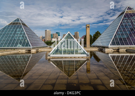 The Muttart Conservatory Pyramids and the city skyline of Edmonton ...