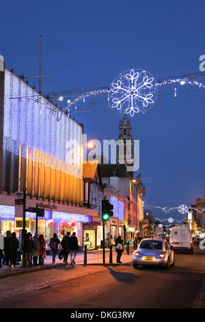 COLCHESTER HIGH STREET IN DECEMBER WITH XMAS LIGHTS SHOWING THE TOWN HALL CLOCK TOWER Stock Photo