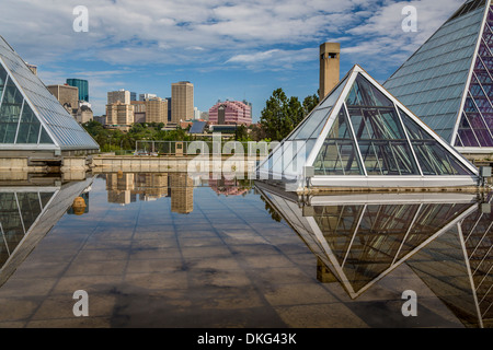 The Muttart Conservatory Pyramids and the city skyline of Edmonton ...