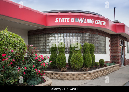 Bowling alley with shrubs trimmed in the shape of bowling pins. Ilion, New York State. Stock Photo