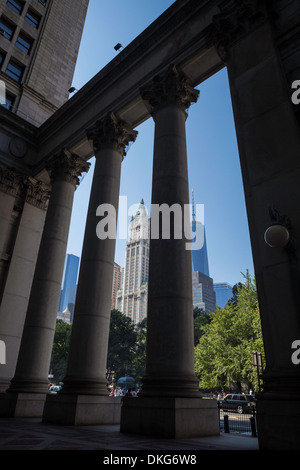 Municipal Building Columns with the Woolworth Building in the Background, NYC Stock Photo