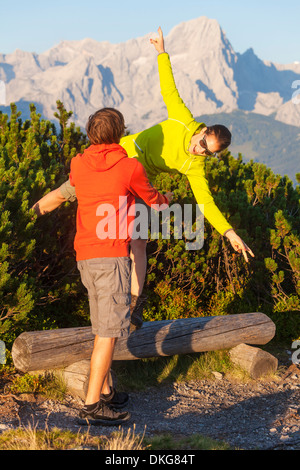 Young couple at peak of Gerzkopf, Bischofsmuetze, Gosaukamm, Dachstein, Salzburger Land, Austria, Europe Stock Photo