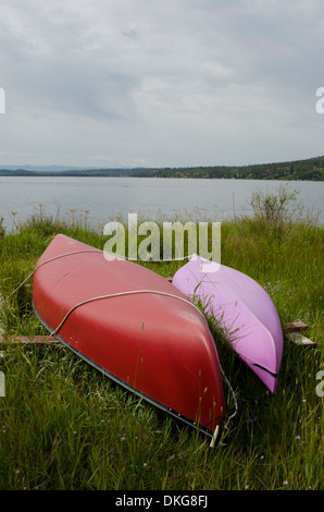 Two canoes have been dry docked at the end of summer on Grand Lake near Rocky Mountain National Park. Stock Photo