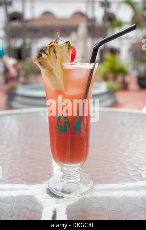 Singapore Sling at Raffles Hotel. Singapore. Stock Photo