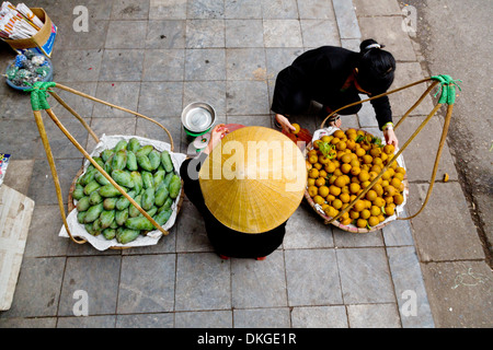 Typical Street Seller in Hanoi, Vietnam Stock Photo