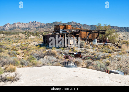 Old wooden abandoned house in the desert Stock Photo