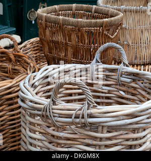 Selection of hand-made wicker log baskets. Stock Photo