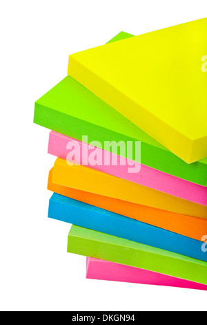 Stack of Sticky Note Pads over a white background. Stock Photo