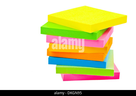 Stack of Sticky Note Pads over a white background. Stock Photo