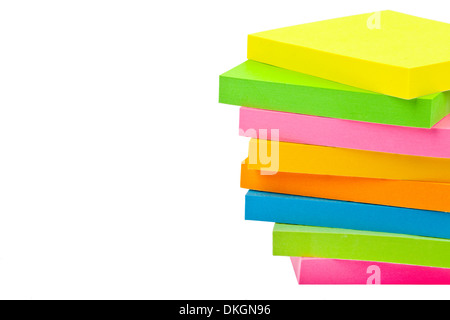 Stack of Sticky Note Pads over a white background. Stock Photo
