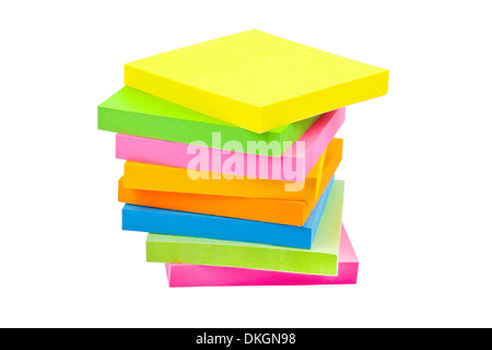 Stack of Sticky Note Pads over a white background. Stock Photo