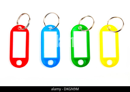 Coloured Key Tags over a white background. Stock Photo