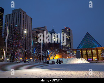 A night view of Edmonton City Hall, Sir Winston Churchill Square, and downtown Edmonton in winter.  Edmonton, Alberta, Canada. Stock Photo